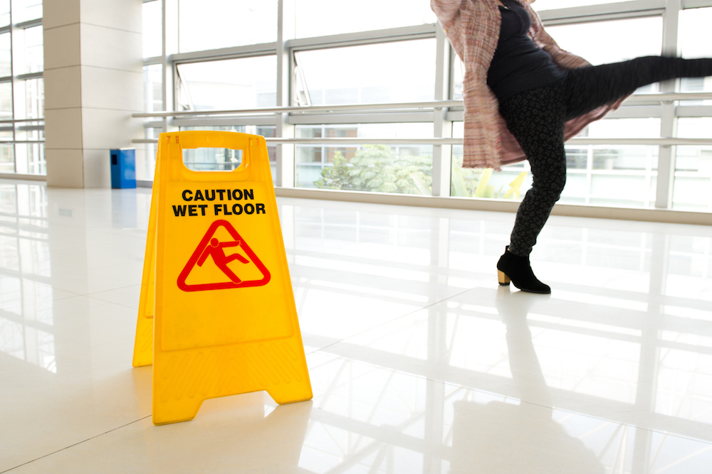 woman slipping on wet flood O'Fallon MO